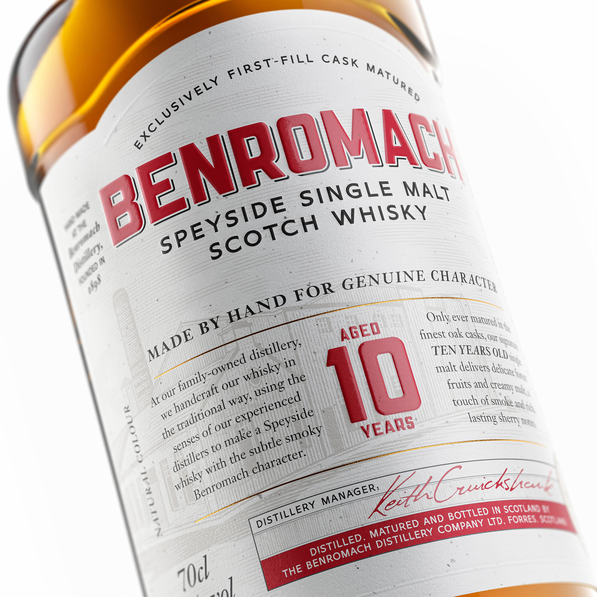 Close up of Benromach bottle on white background
